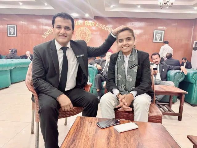 Two advocates seated at the Sindh High Court Bar Association