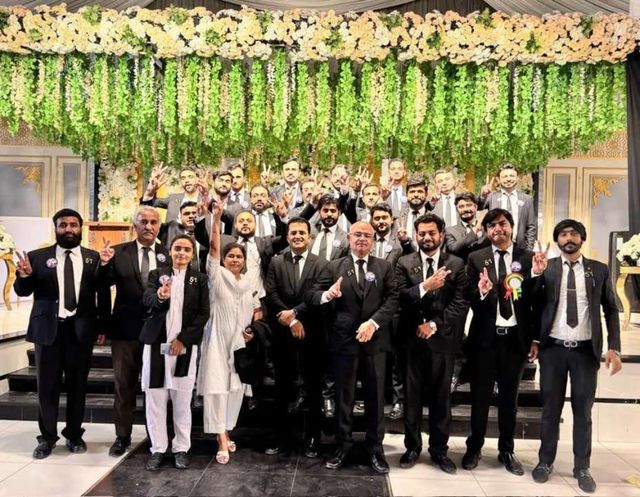 A large group of advocates and guests at a function
