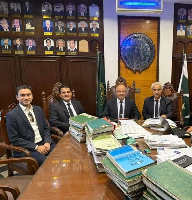 Advocates seated together at the Sindh High Court Bar Association office
