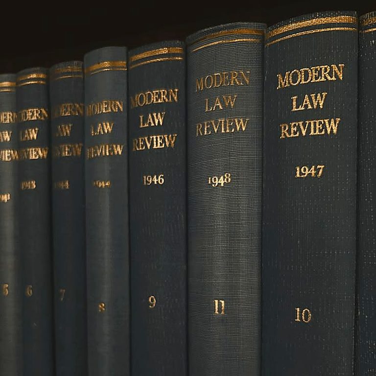 Bound law reports on a shelf